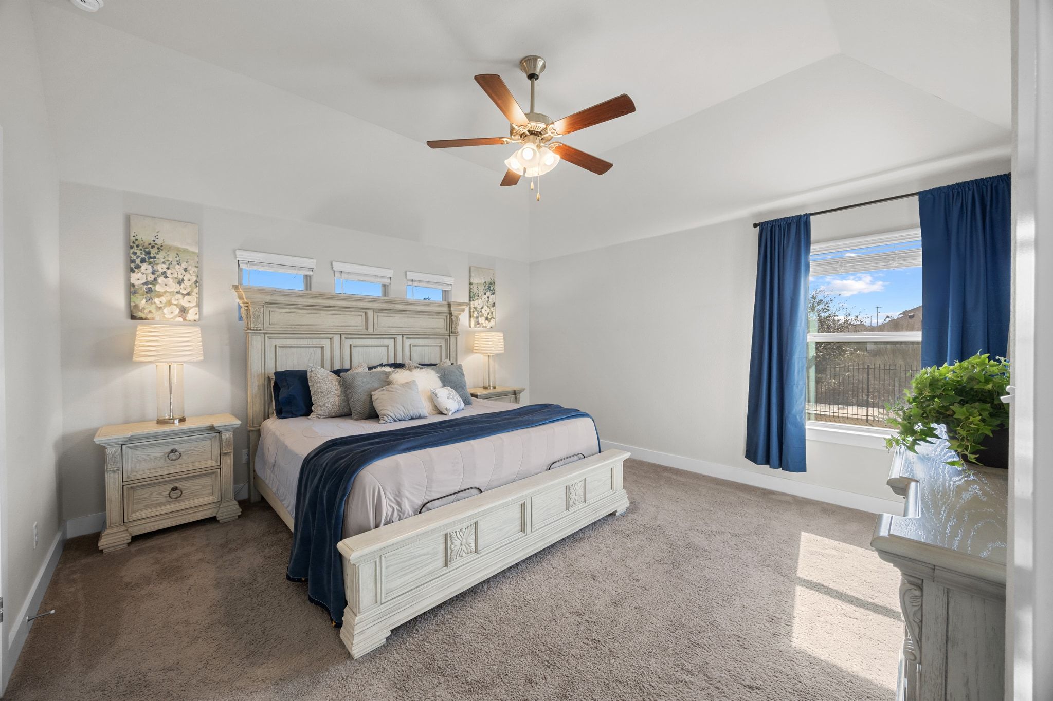 4807 Portillo Way Pflugerville, TX 78660 - Photo 11 of 24 Carpeted bedroom with ceiling fan and baseboards