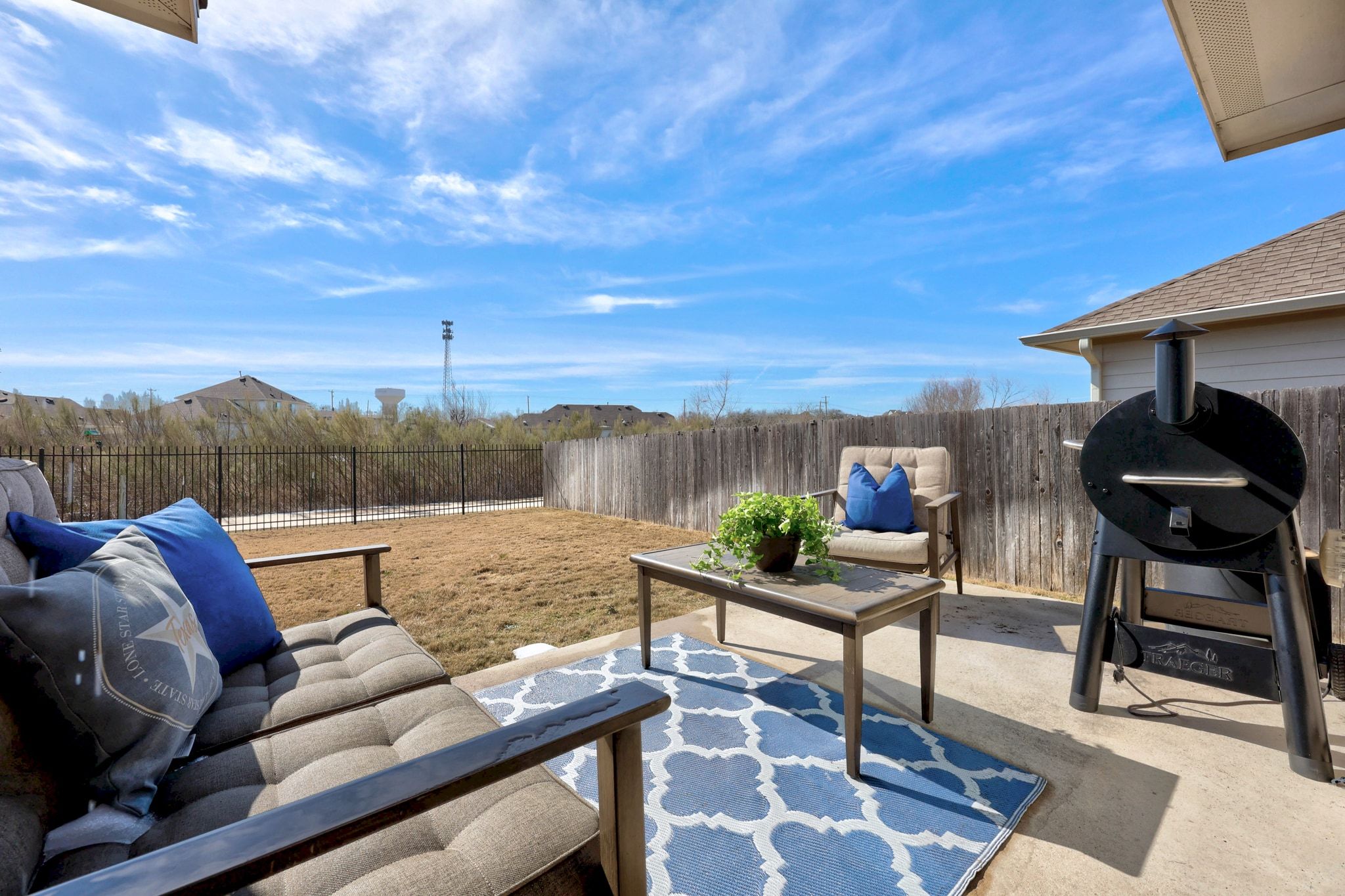 4807 Portillo Way Pflugerville, TX 78660 - Photo 18 of 24 Fenced backyard with outdoor lounge area, a patio, and area for grilling