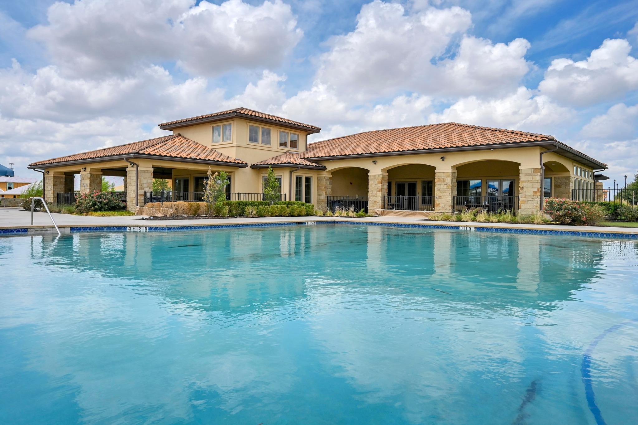 4807 Portillo Way Pflugerville, TX 78660 - Photo 22 of 24 Community pool featuring a patio area