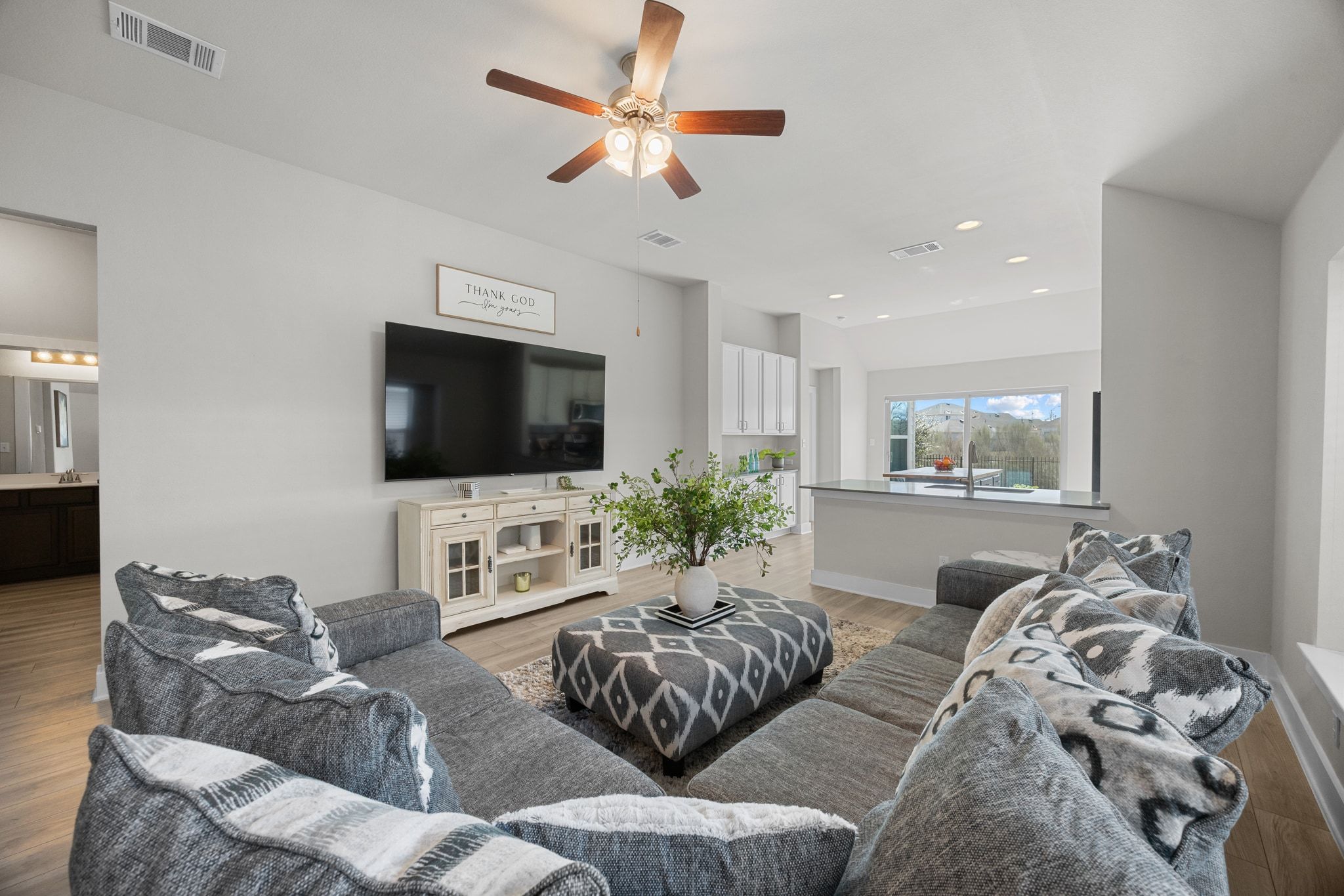 4807 Portillo Way Pflugerville, TX 78660 - Photo 6 of 24 Living area with wood finished floors, a ceiling fan, and recessed lighting