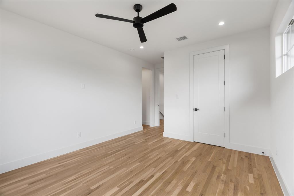 3316 Ferguson Road Grapevine, TX 76092 - Photo 24 of 39 a view of a room with wooden floor and ceiling fan