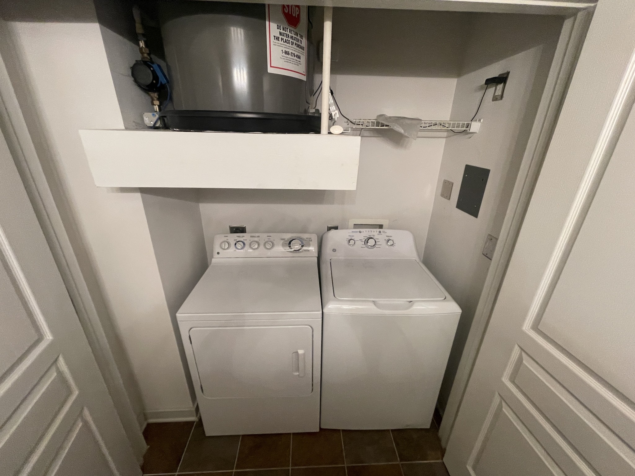 3000 Vanderbilt Place, Unit 412 Nashville, TN 37212 - Photo 11 of 13 a bathroom with a sink and mirror