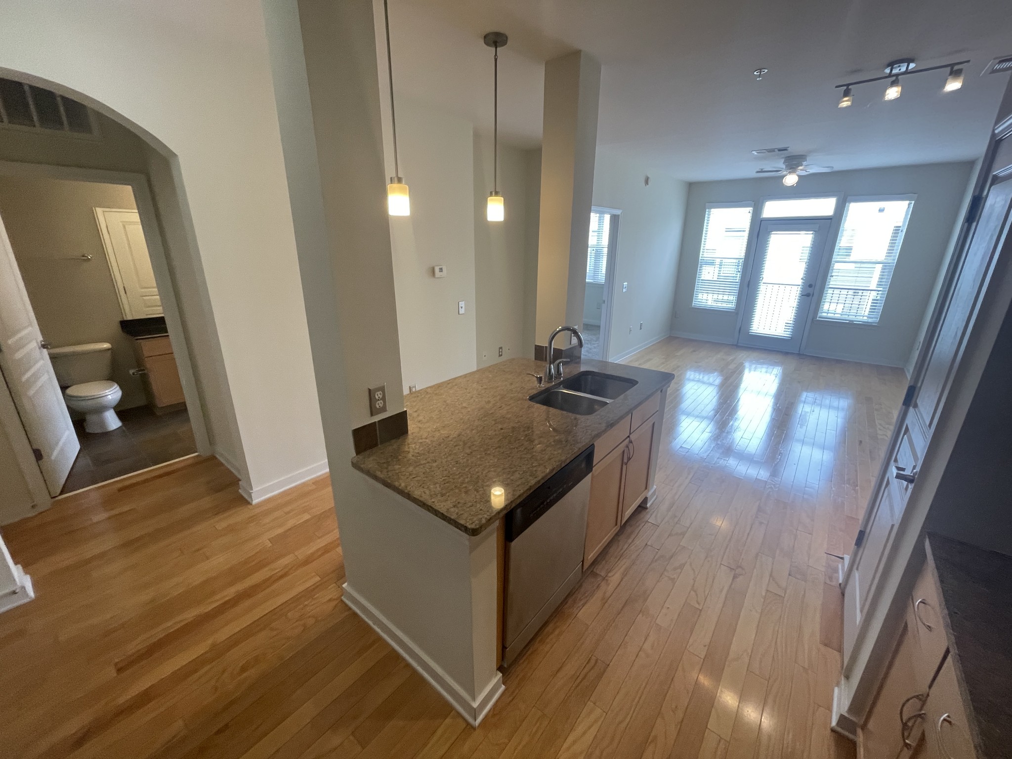3000 Vanderbilt Place, Unit 412 Nashville, TN 37212 - Photo 4 of 13 a kitchen with stainless steel appliances granite countertop a refrigerator a sink and a stove