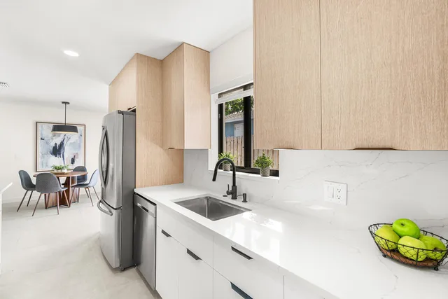 a bathroom with a shower and a mirror