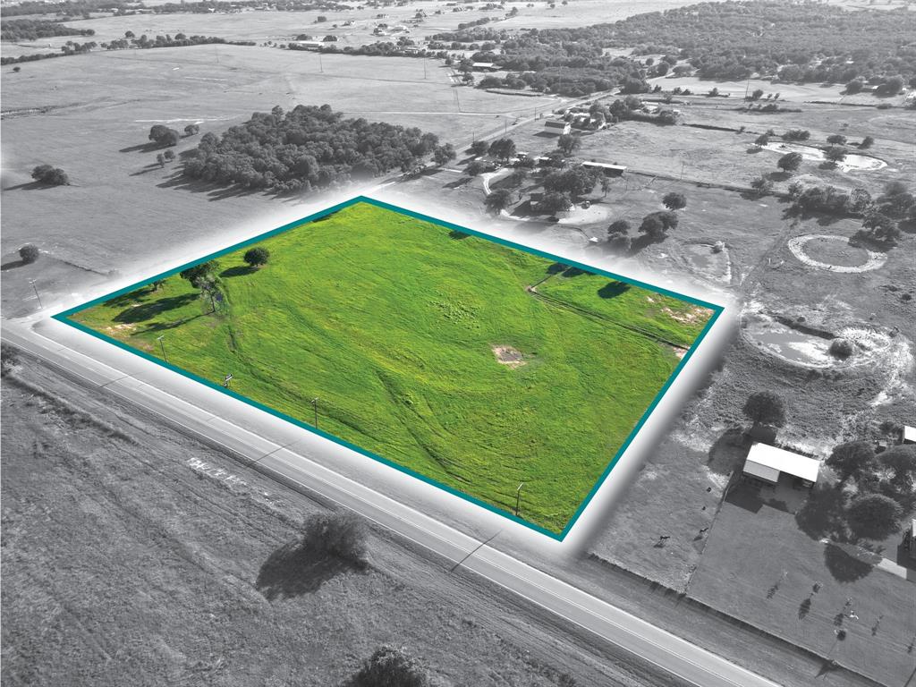 0 Division Lane Poolville, TX 76487 - Photo 1 of 11 a view of a back yard of a house