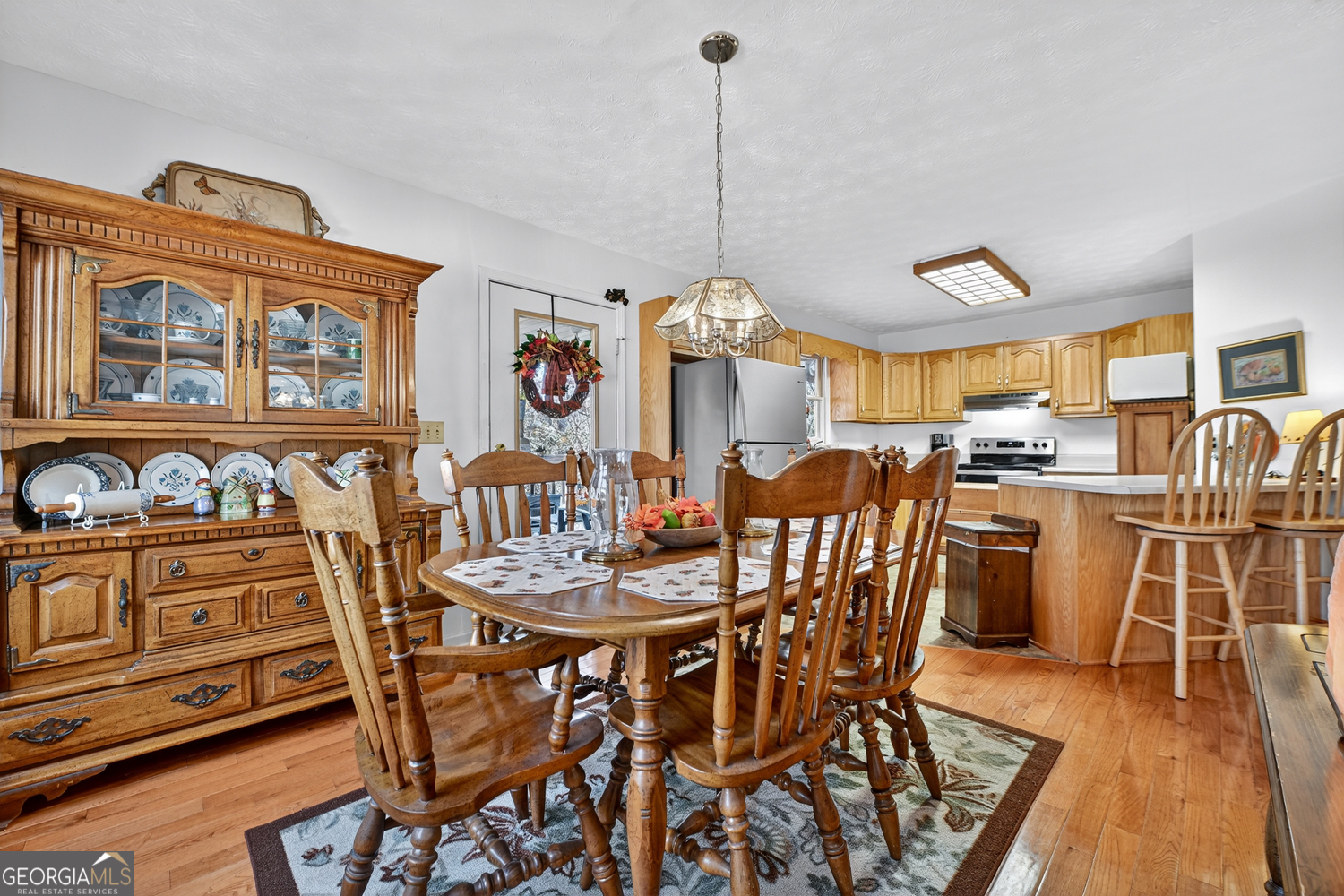 122 D D J Lane Ellijay, GA 30540 - Photo 20 of 51 a view of a dining room with furniture window and wooden floor