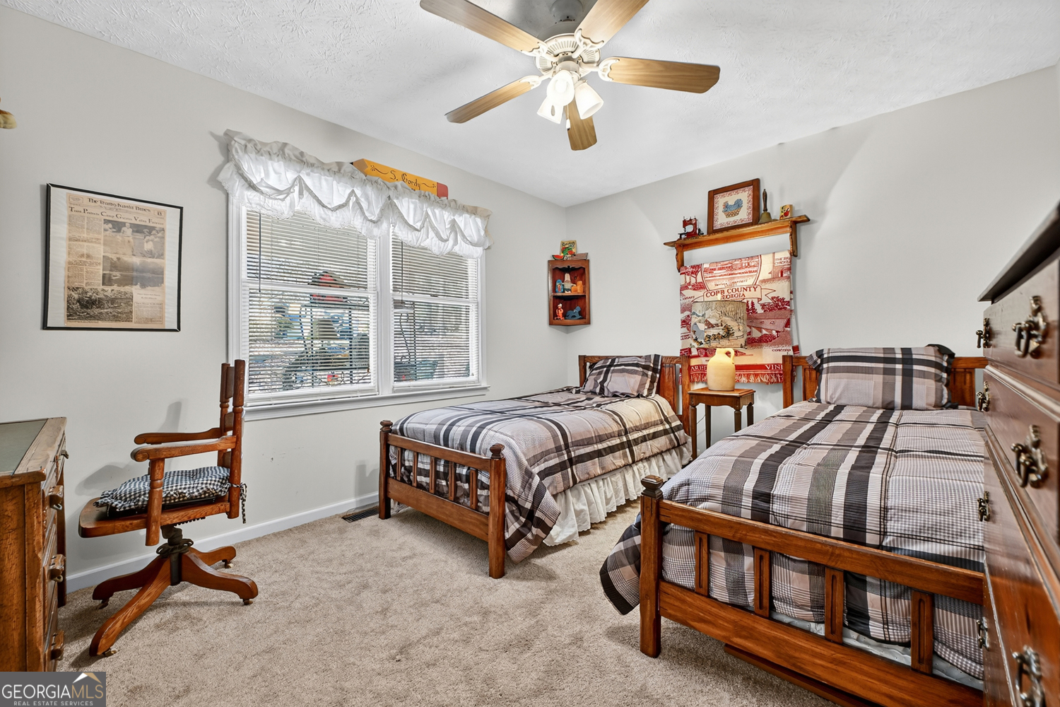 122 D D J Lane Ellijay, GA 30540 - Photo 28 of 51 a bedroom with two beds and a window