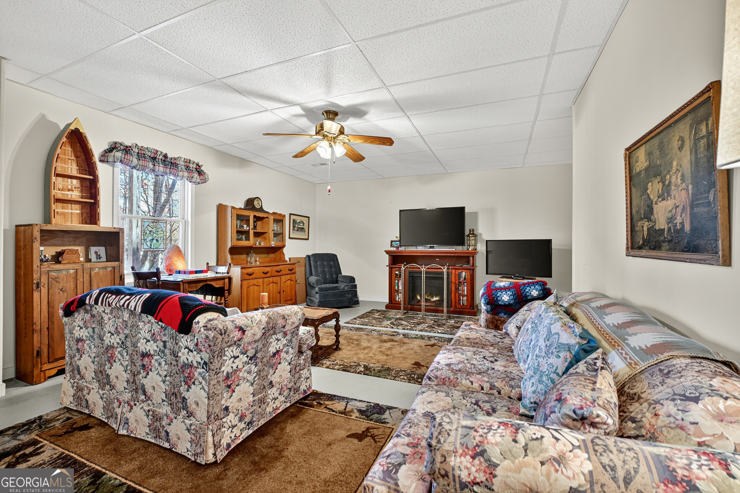 122 D D J Lane Ellijay, GA 30540 - Photo 38 of 51 a bed room with furniture and a flat screen tv