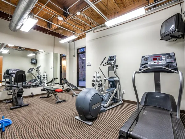 a view of a room with gym equipment