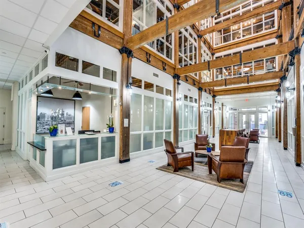 a lobby with furniture and outdoor seating