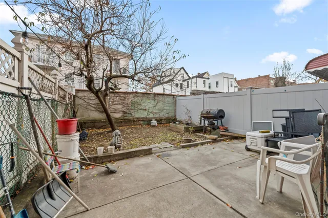a view of a chairs and tables in the patio