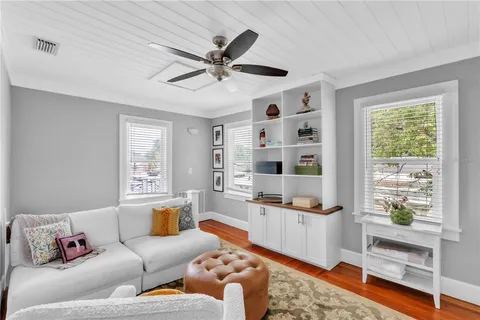 a living room with furniture and a window