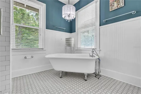 a bathroom with a sink a toilet and a bathtub