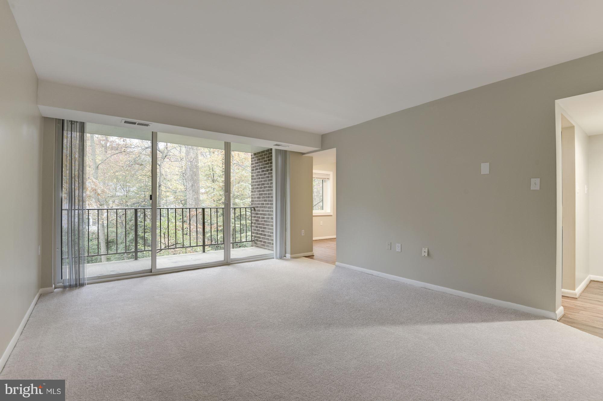 1538 Northgate Square, Unit 1A Reston, VA 20190 - Photo 1 of 18 a view of an empty room with a window