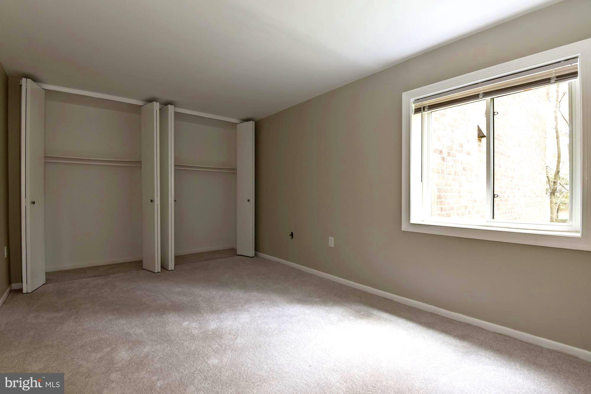 1538 Northgate Square, Unit 1A Reston, VA 20190 - Photo 13 of 18 a view of an empty room with a window