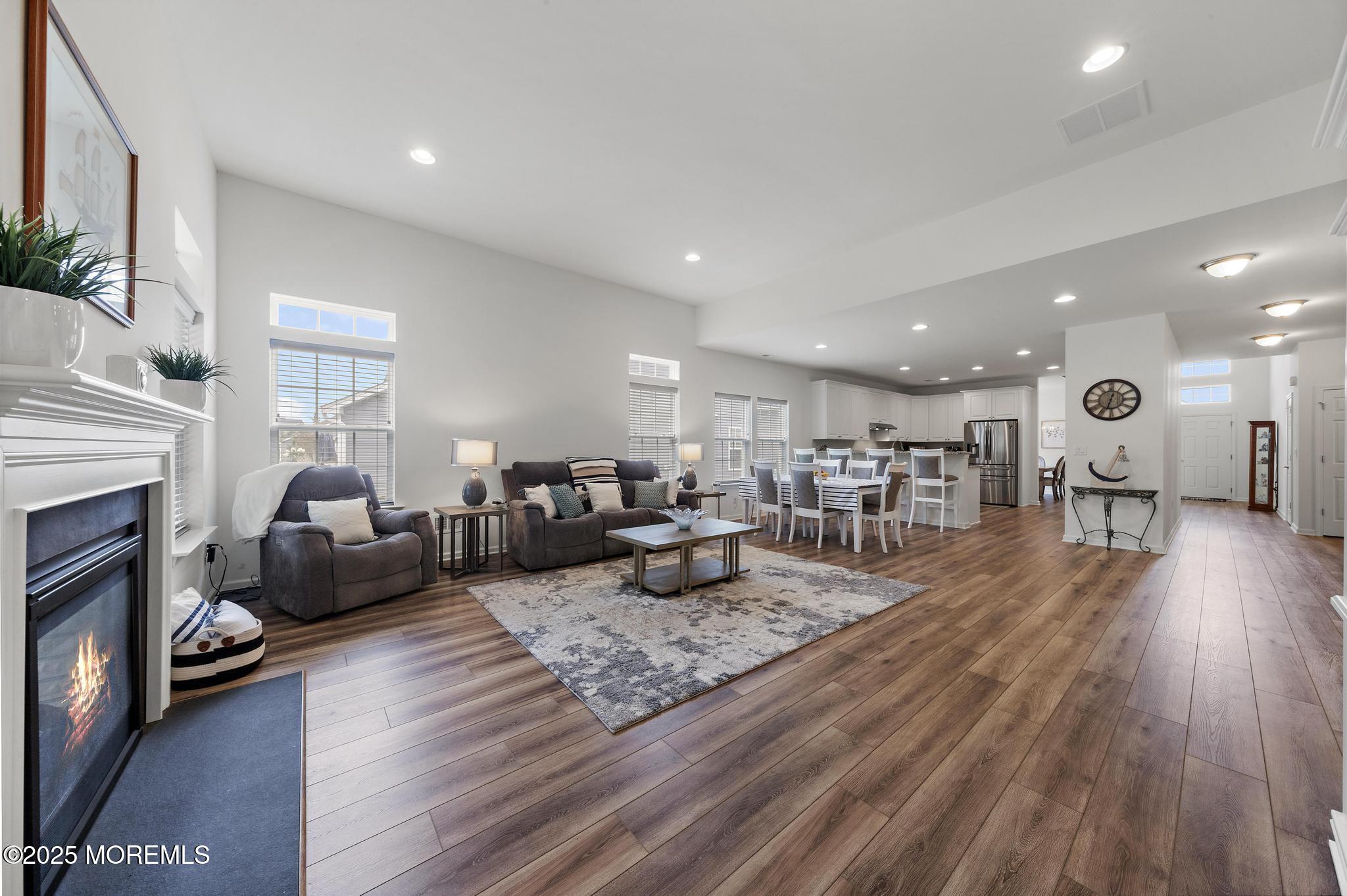 21 Aurora Circle Barnegat, NJ 08005 - Photo 13 of 79 a living room with furniture and a fireplace