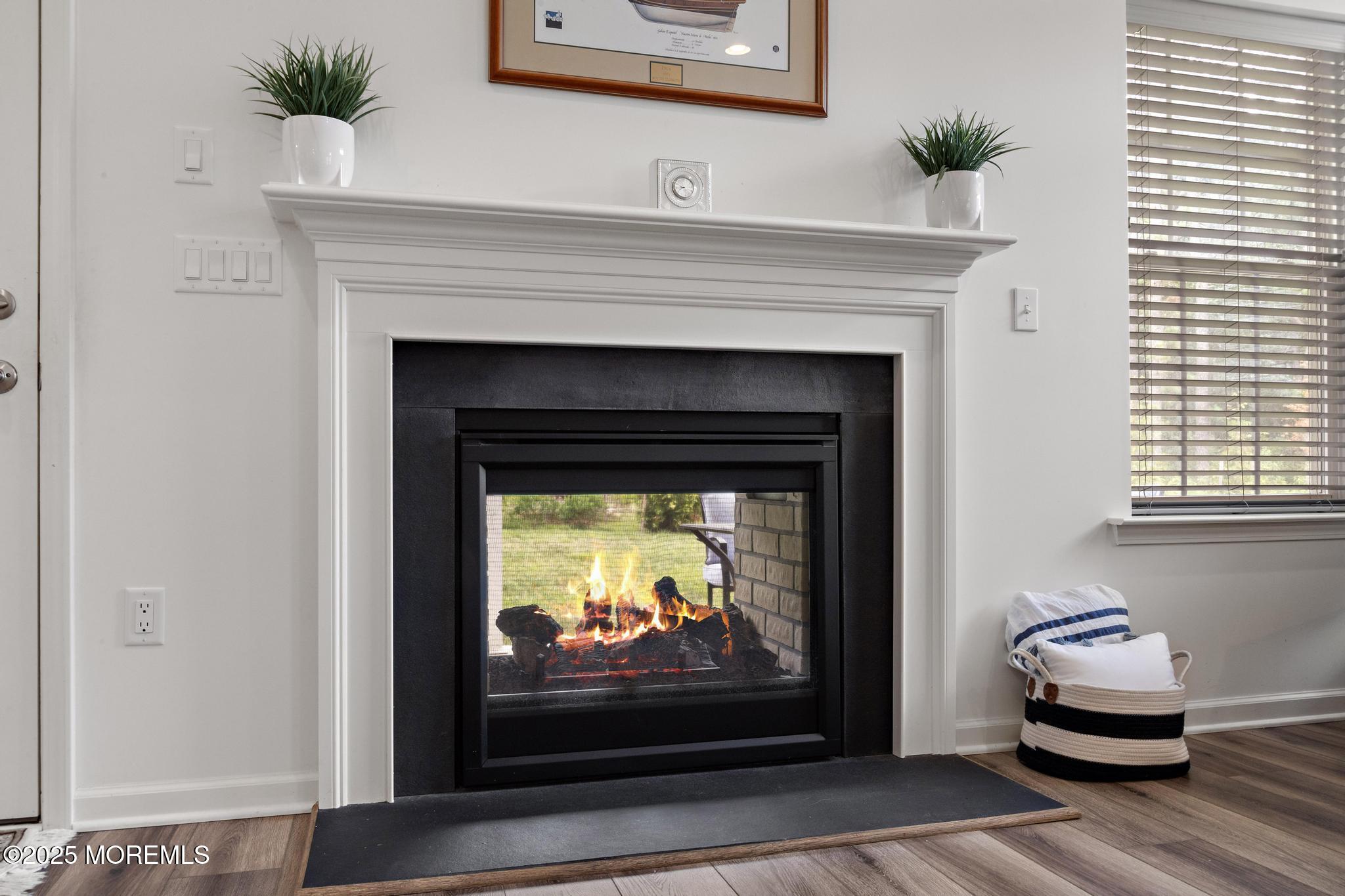 21 Aurora Circle Barnegat, NJ 08005 - Photo 19 of 79 a living room with a fireplace and a fireplace
