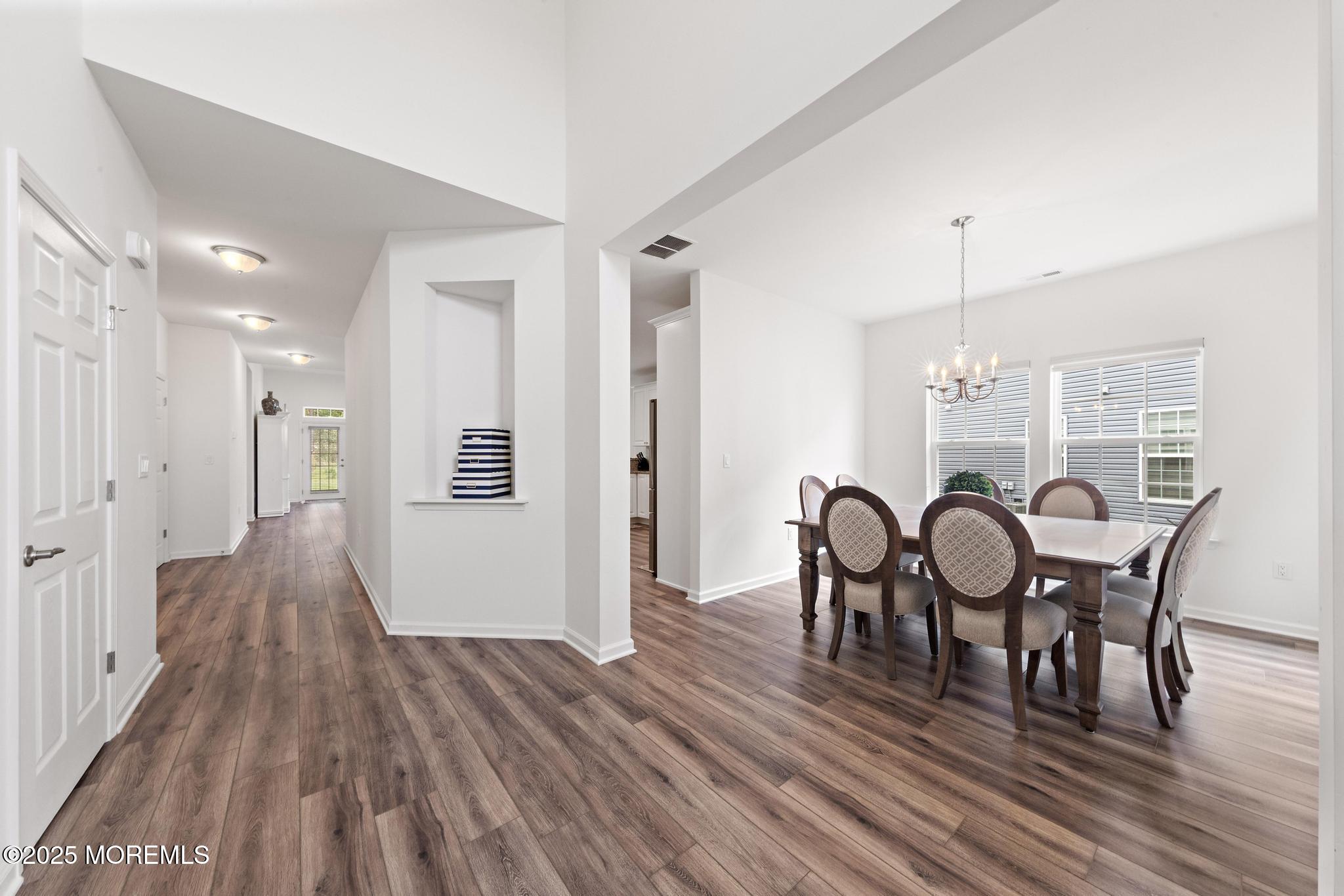 21 Aurora Circle Barnegat, NJ 08005 - Photo 39 of 79 a view of a dining room with furniture and wooden floor