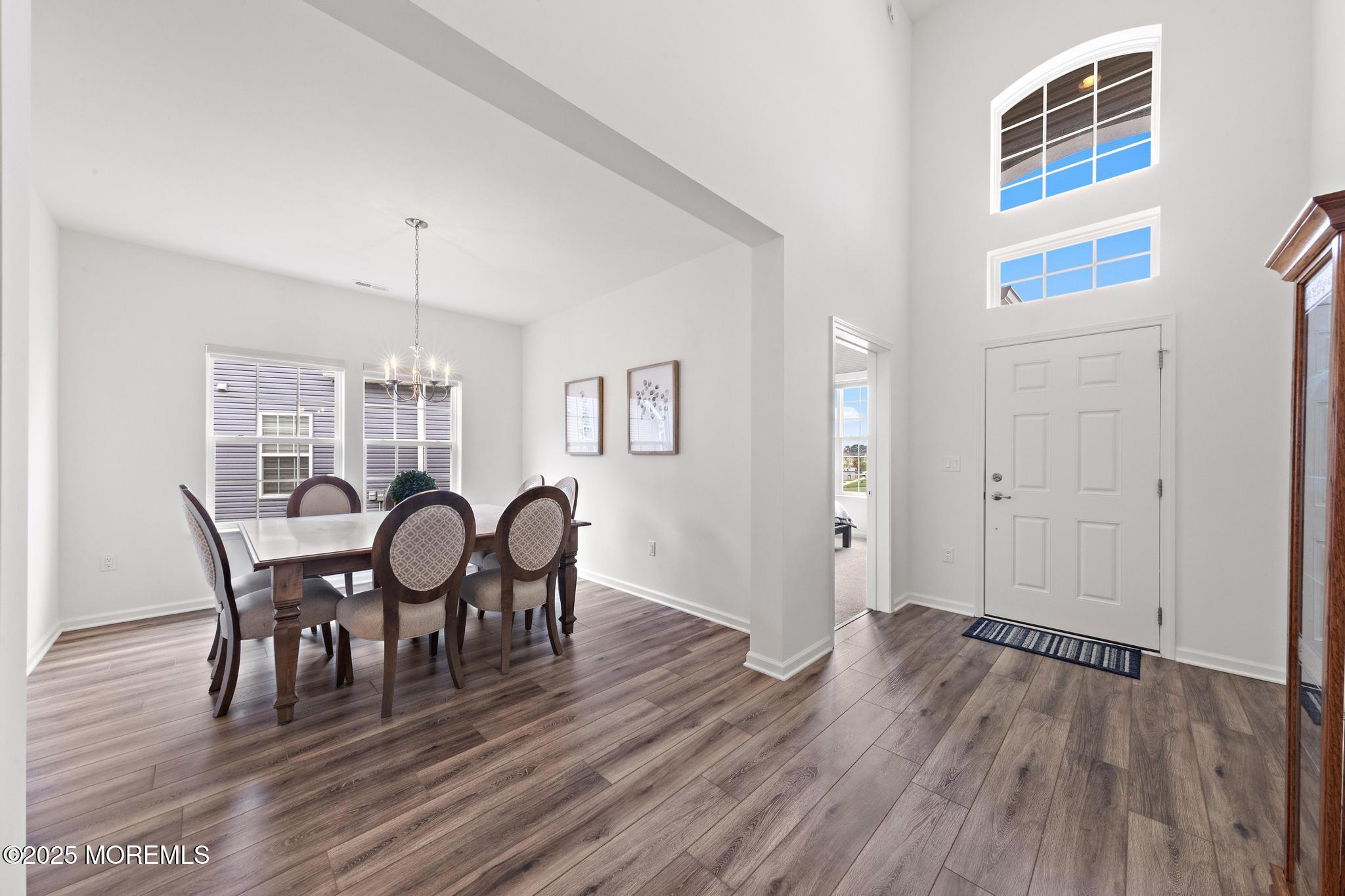 21 Aurora Circle Barnegat, NJ 08005 - Photo 40 of 79 a view of a dining room with furniture and wooden floor