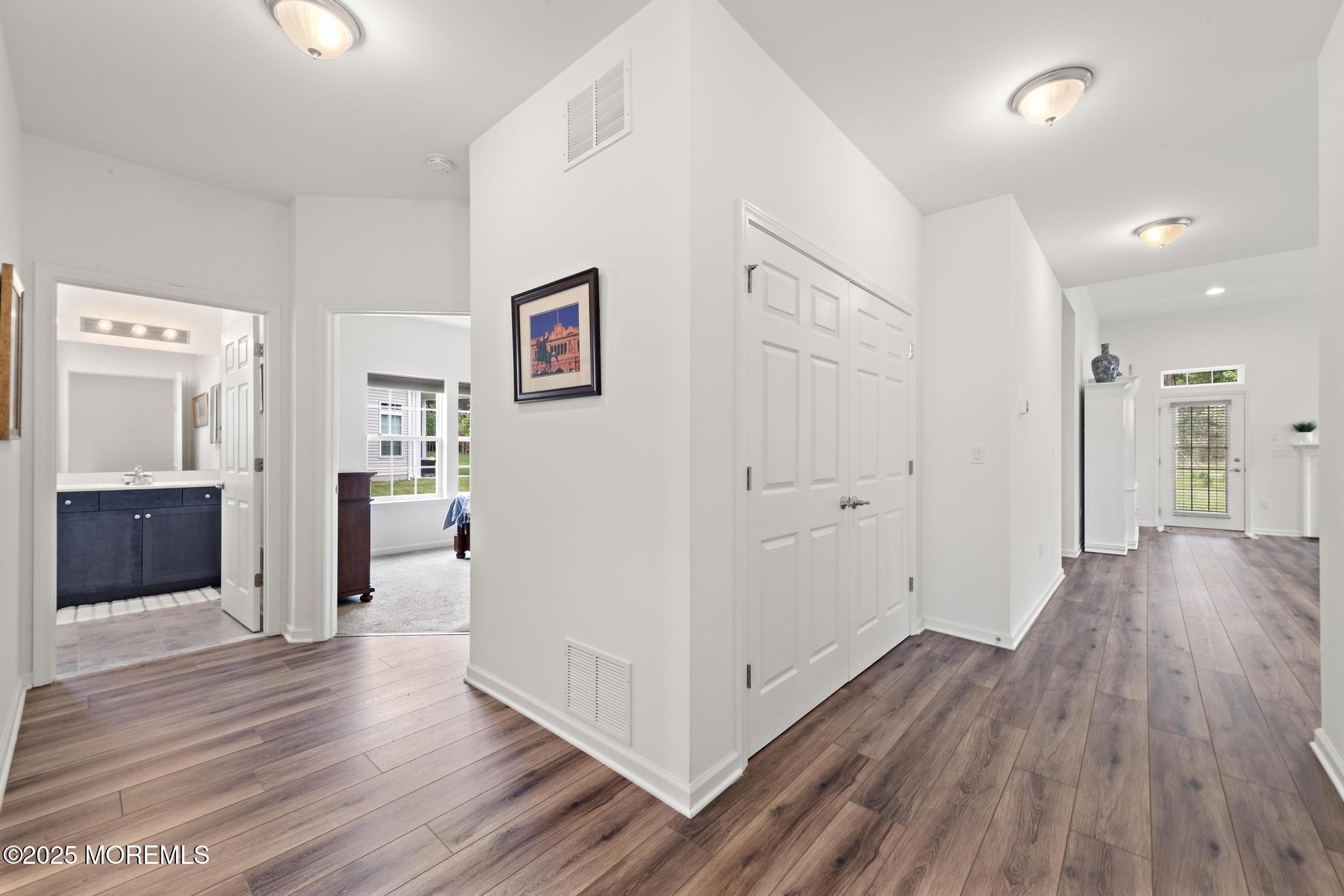 21 Aurora Circle Barnegat, NJ 08005 - Photo 41 of 79 a view of a hallway with wooden floor