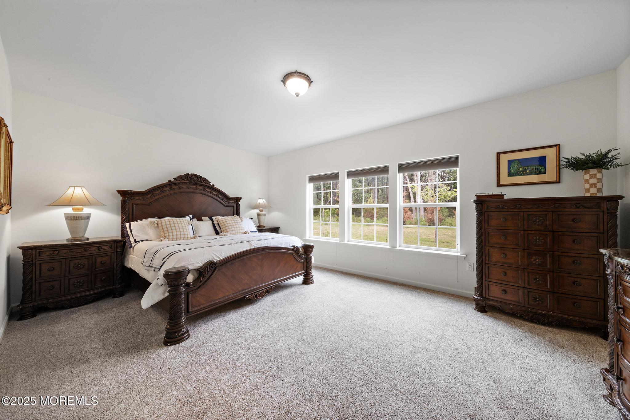 21 Aurora Circle Barnegat, NJ 08005 - Photo 43 of 79 a bedroom with a bed and a window
