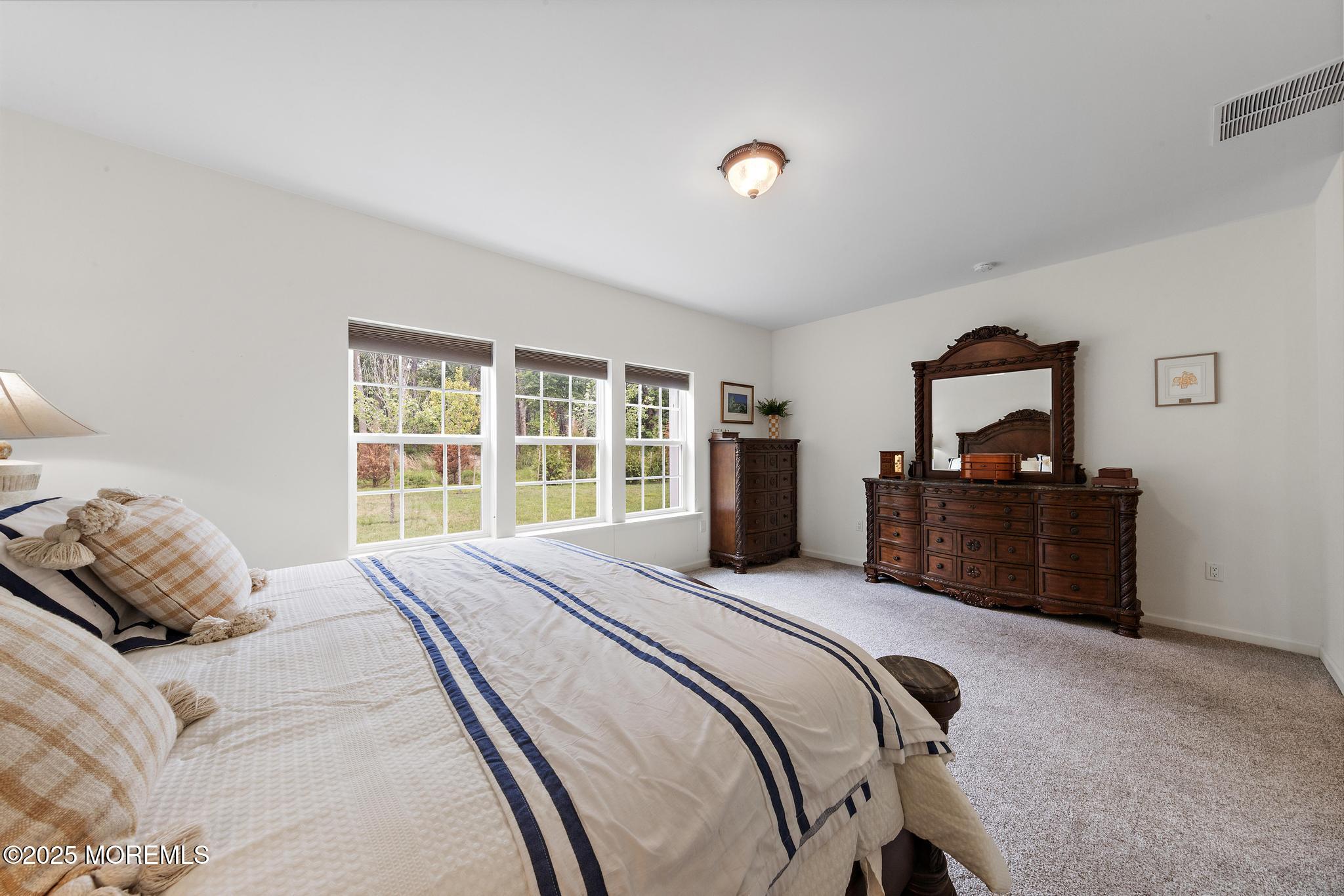 21 Aurora Circle Barnegat, NJ 08005 - Photo 46 of 79 a bedroom with a bed and a window