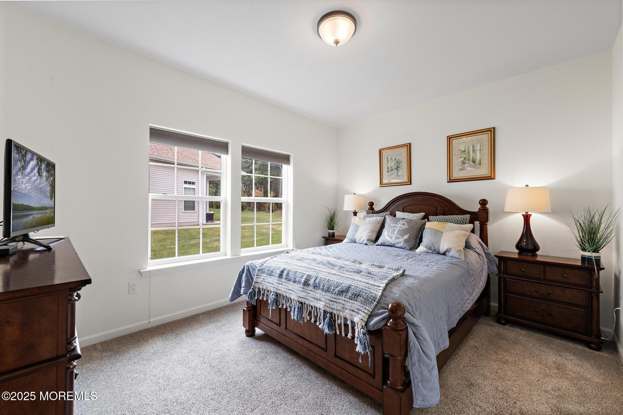 21 Aurora Circle Barnegat, NJ 08005 - Photo 51 of 79 a bedroom with a bed next to a window