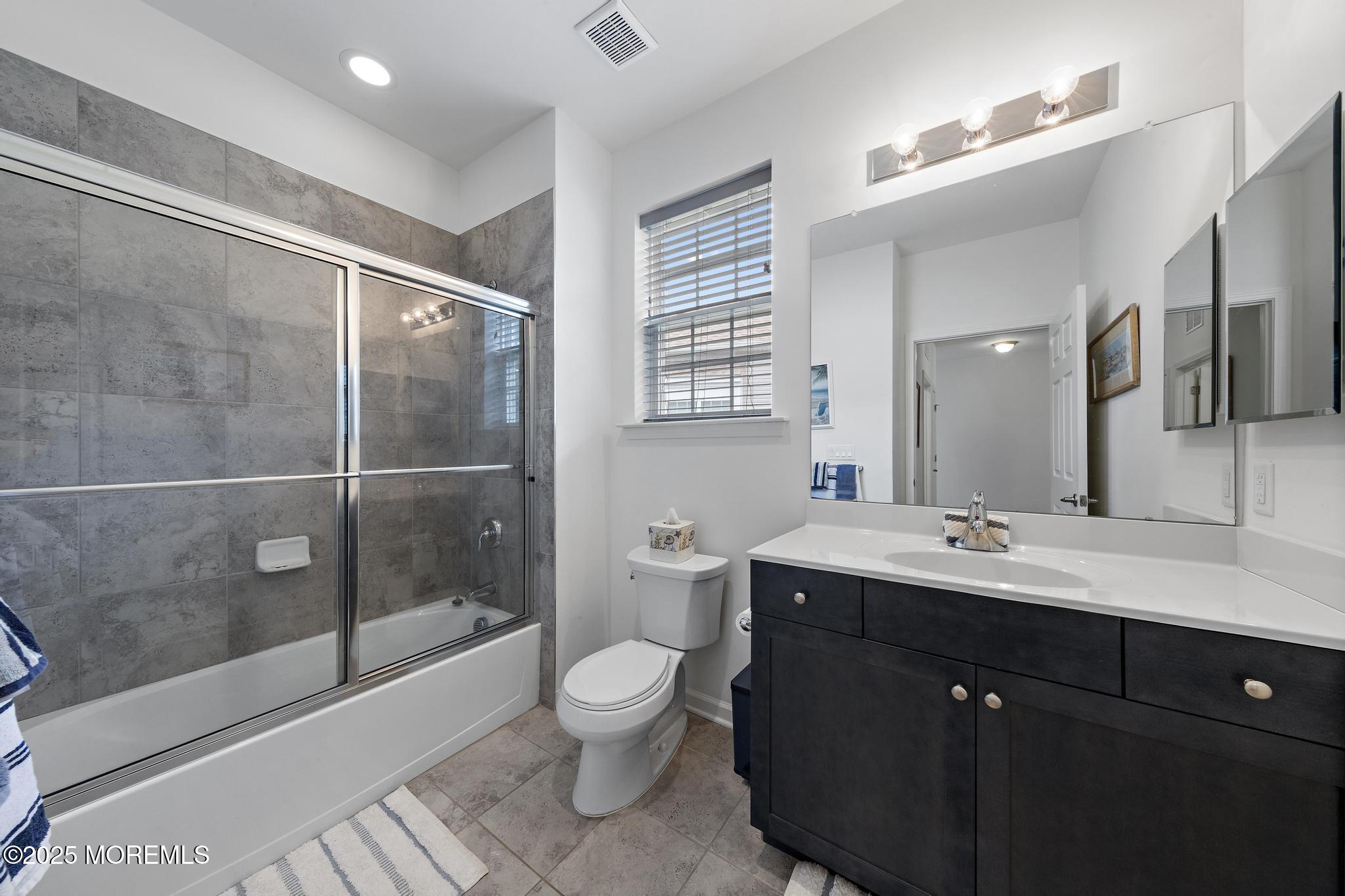 21 Aurora Circle Barnegat, NJ 08005 - Photo 53 of 79 a spacious bathroom with a sink toilet and shower
