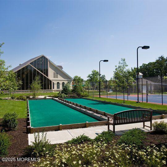 21 Aurora Circle Barnegat, NJ 08005 - Photo 71 of 79 a view of a house with garden and a bench