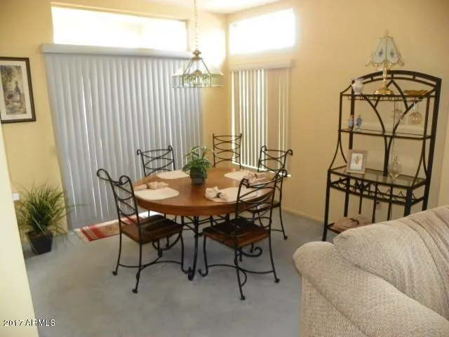 a view of bedroom and hallway