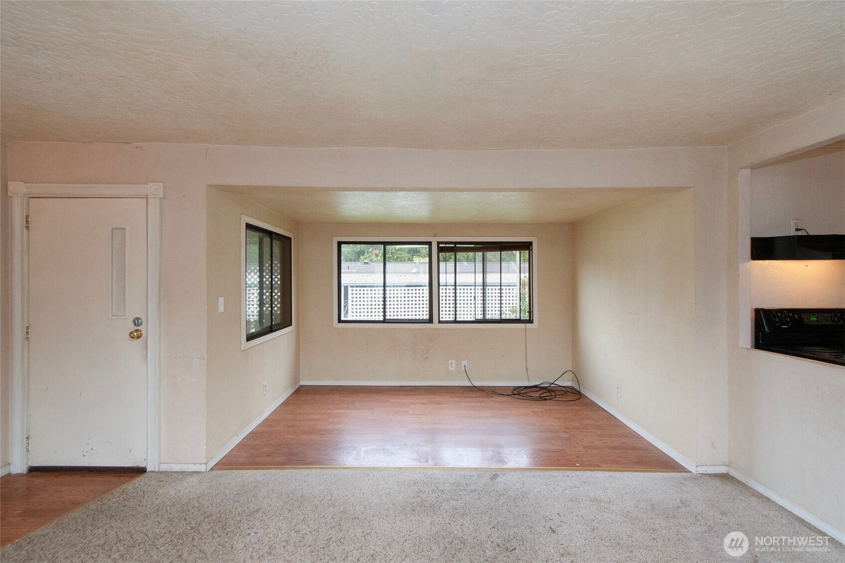 90 Baywood Village Road, Unit 34 Sequim, WA 98382 - Photo 9 of 40 an empty room with windows
