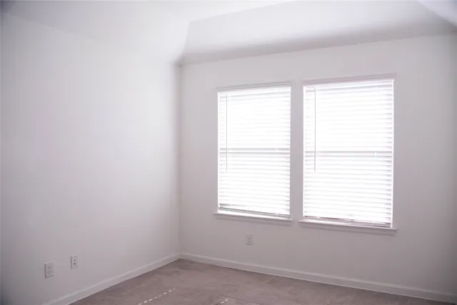 a view of walk in closet with window