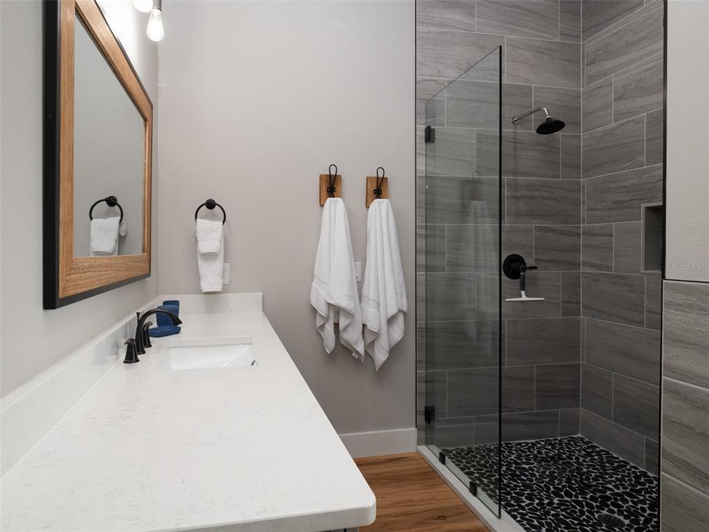 4988 Northwest 101st St Road Ocala, FL 34482 - Photo 14 of 30 a bathroom with a sink