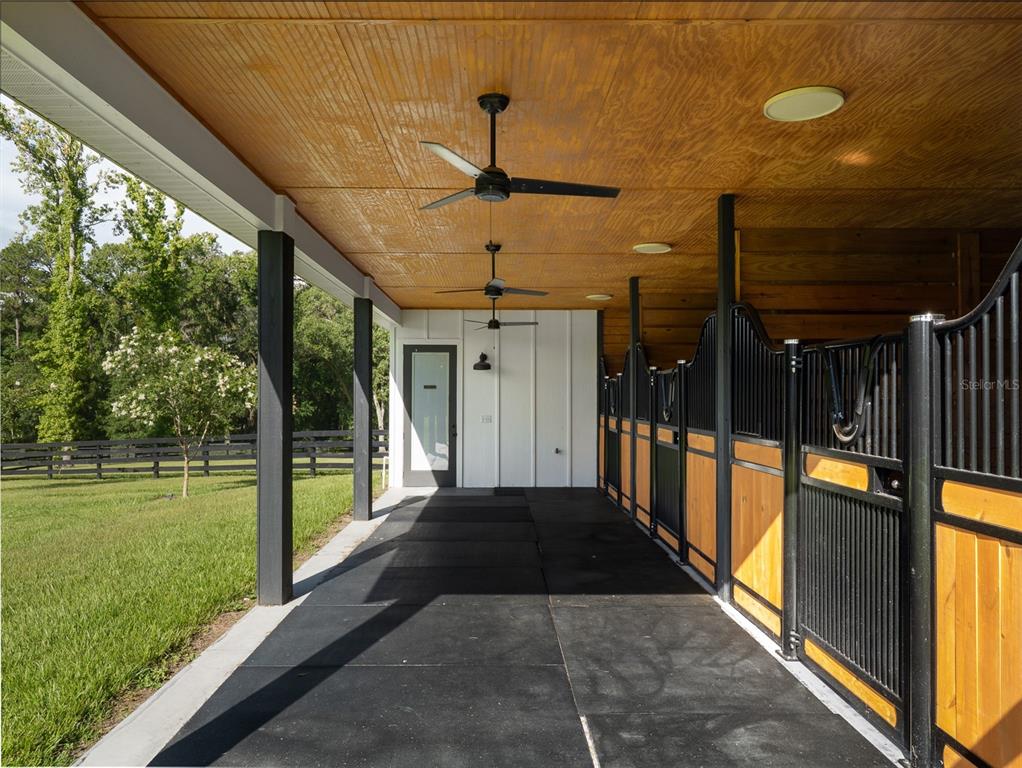 4988 Northwest 101st St Road Ocala, FL 34482 - Photo 24 of 30 a view of a porch with a yard