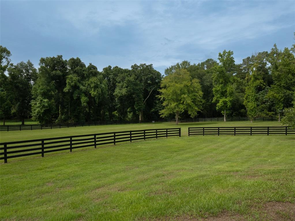4988 Northwest 101st St Road Ocala, FL 34482 - Photo 29 of 30 a view of a tennis court