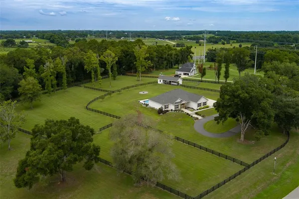a view of a golf course with a building
