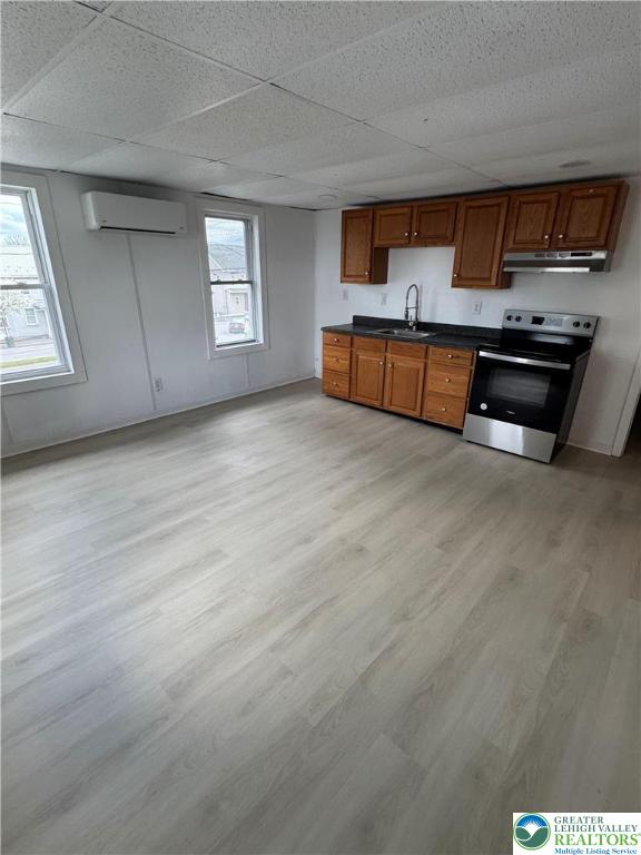2 West Market Street, Unit 3 2 Gratz, PA 17030 - Photo 3 of 5 a view of kitchen with granite countertop cabinets and window