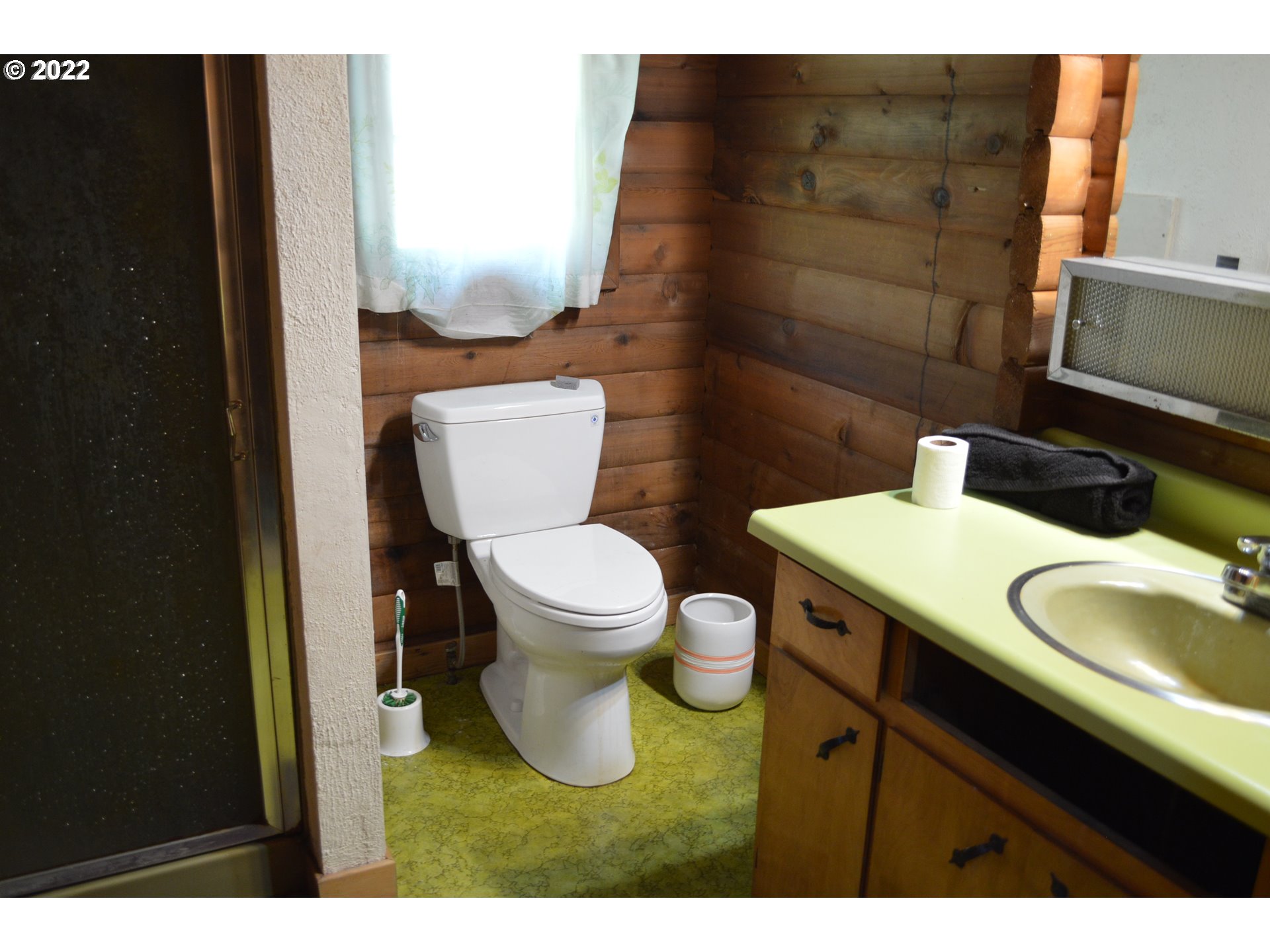 67193 East Barlow Trail Road Rhododendron, OR 97049 - Photo 16 of 19 a bathroom with a granite countertop toilet sink and mirror