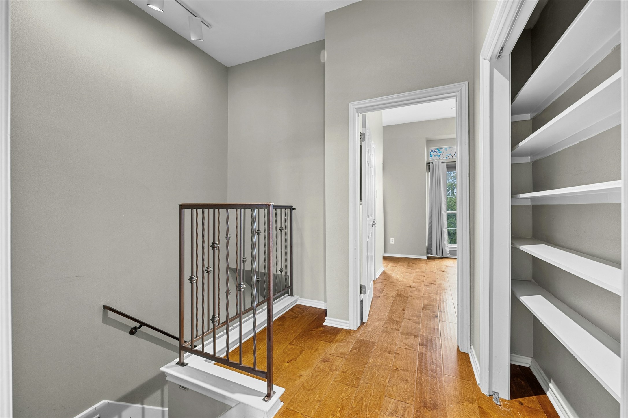 2918 Ranch To Market Road 620, Unit W219 Austin, TX 78734 - Photo 24 of 35 Perfect for linen storage, books, or a decorative display - this landing space adds functional charm.