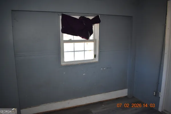 an empty room with windows