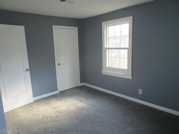 an empty room with a window