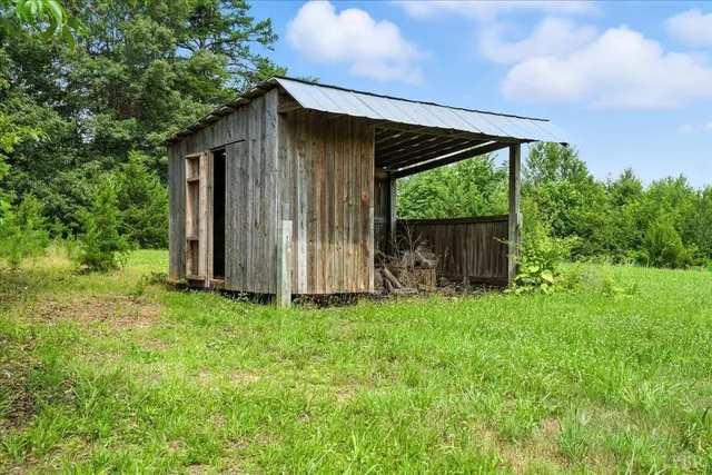a backyard of a house with lots of green space
