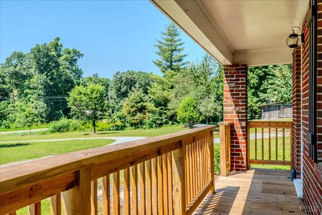 a view of a porch with a yard