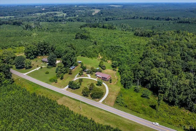 an aerial view of a garden with a yard