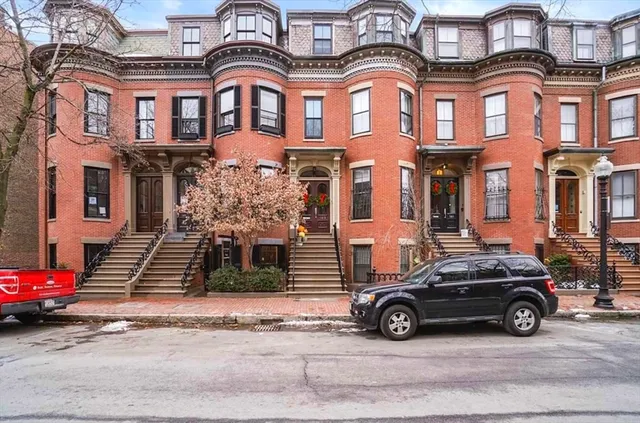 a car parked in front of a building
