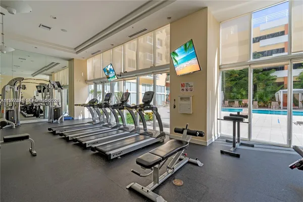 a view of a room with gym equipment