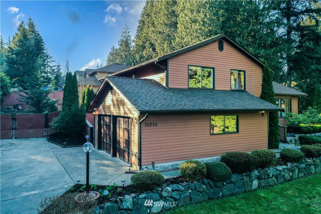 16714 3rd Avenue Southeast Bothell, WA 98012 - Photo 1 of 40 front view of a house with a yard