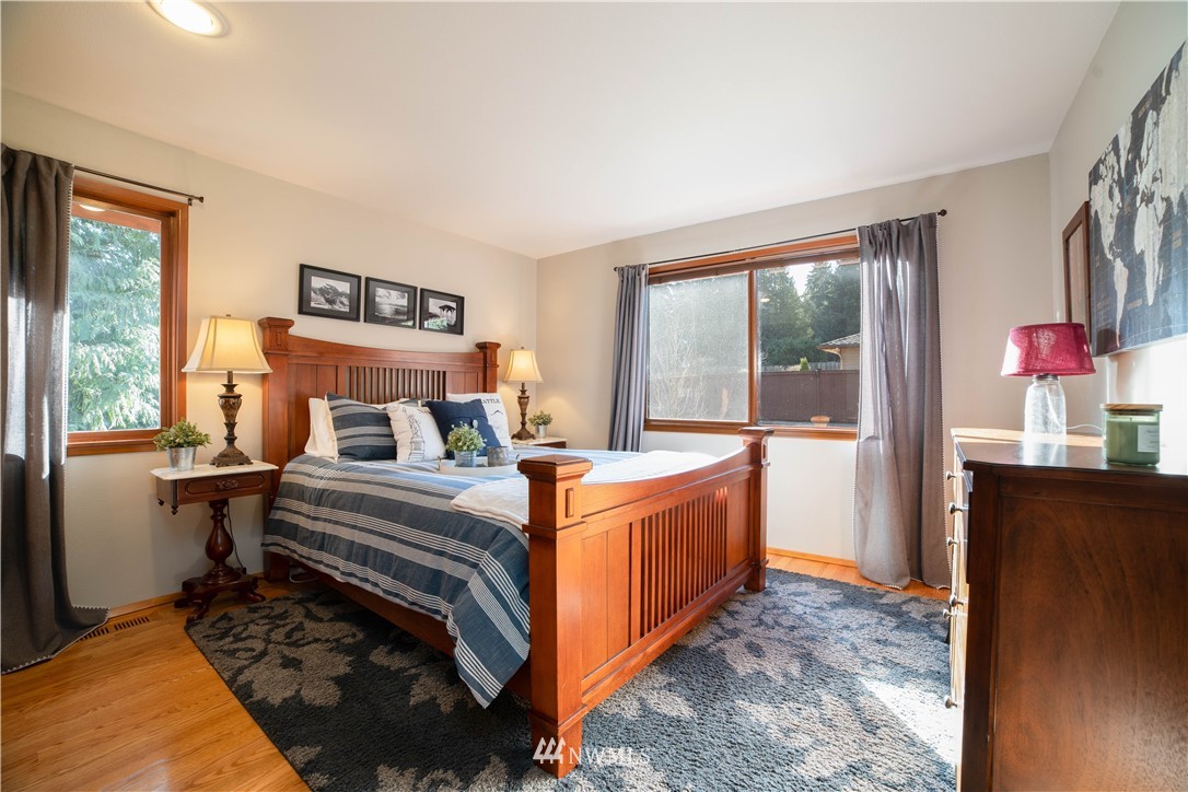 16714 3rd Avenue Southeast Bothell, WA 98012 - Photo 21 of 40 a bed room with a bed and a dresser