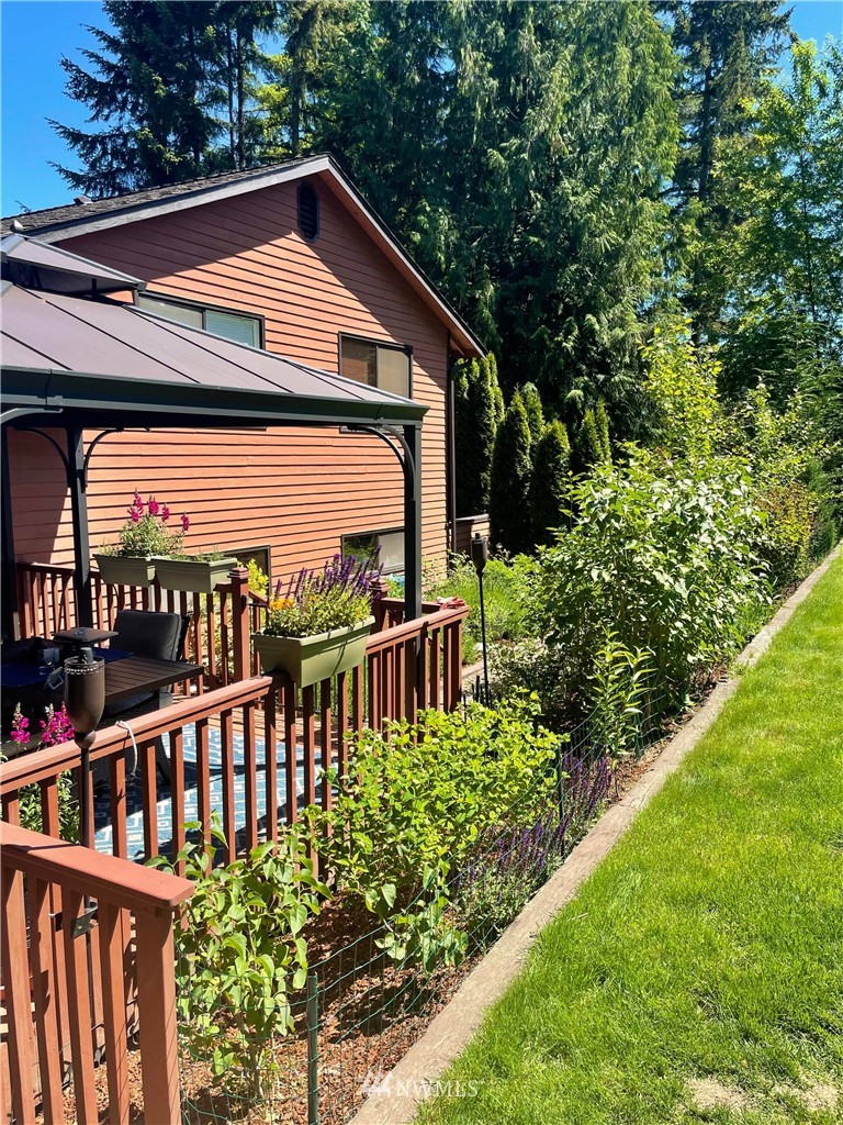 16714 3rd Avenue Southeast Bothell, WA 98012 - Photo 36 of 40 a front view of a house with balcony