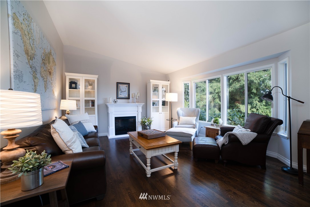 16714 3rd Avenue Southeast Bothell, WA 98012 - Photo 5 of 40 a living room with furniture fireplace and a large window